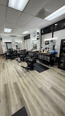 John's Barber Shop logo